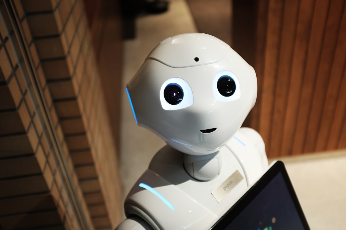 Advanced white humanoid robot head representing AI governance and DeepMind Institute frontier safety research